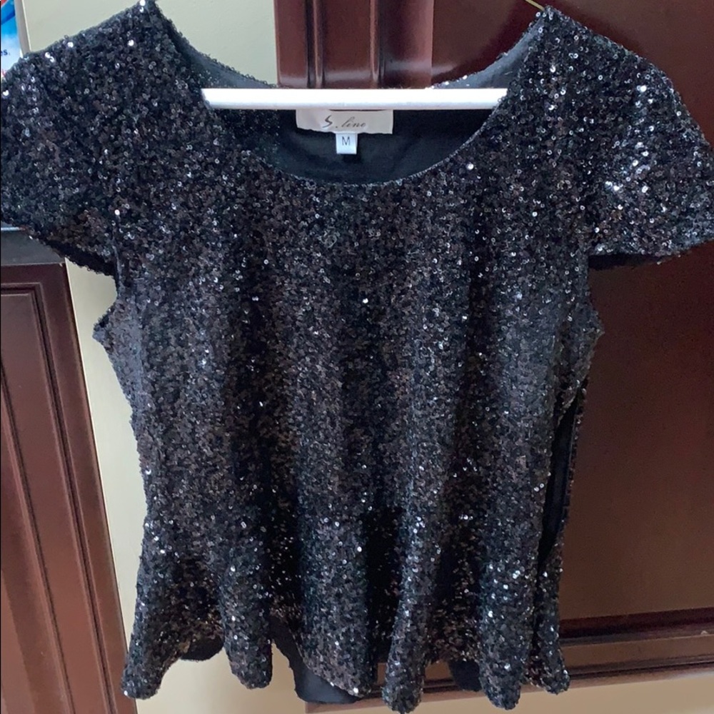 Black peplum sequin top